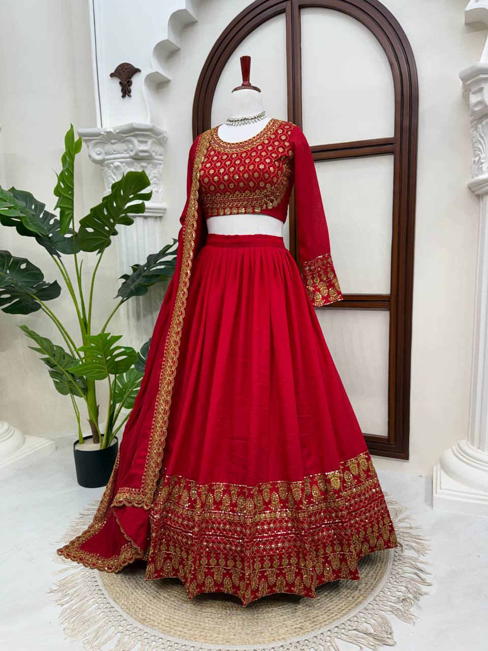 Classic Crimson Red Bridal Lehenga Choli Featuring Opulent Gold Zari Embroidery and Scalloped Borders
